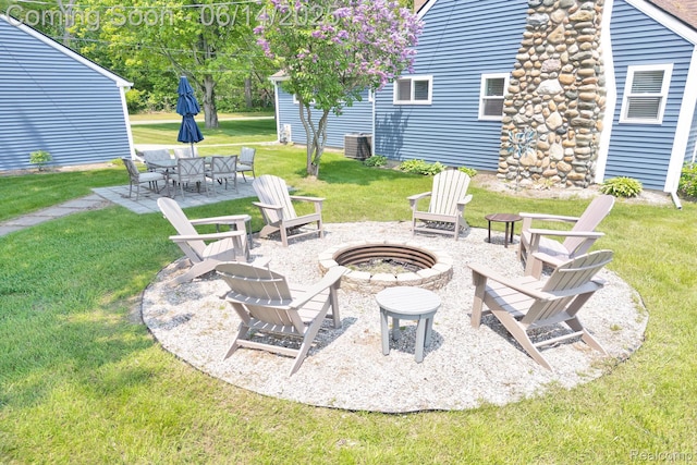 2968 Wolverine Rd, East Tawas, MI 48730 - view of patio with a fire pit