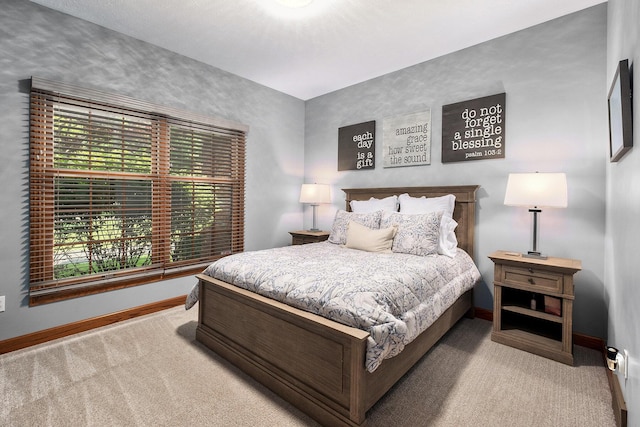 6526 Ada Dr SE, Ada, MI 49301 - carpeted bedroom featuring baseboards