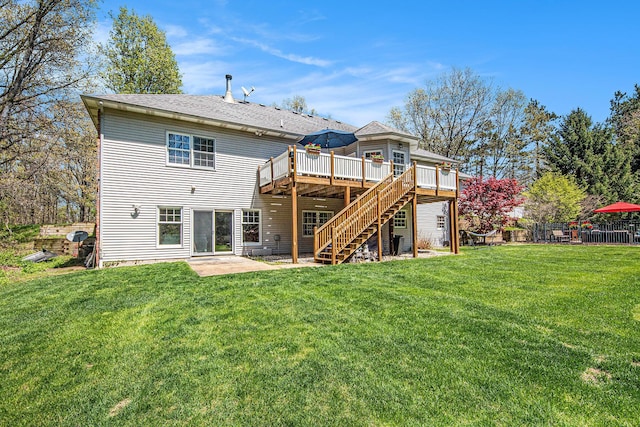 6526 Ada Dr SE, Ada, MI 49301 - back of house with a wooden deck, stairway, and a patio area