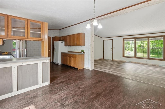 3251 W Dana Rd, Coleman, MI 48618 - kitchen featuring freestanding refrigerator, lofted ceiling, crown molding, glass insert cabinets, and dark wood-style flooring