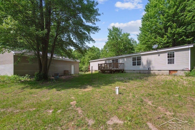 3251 W Dana Rd, Coleman, MI 48618 - view of green lawn featuring a deck