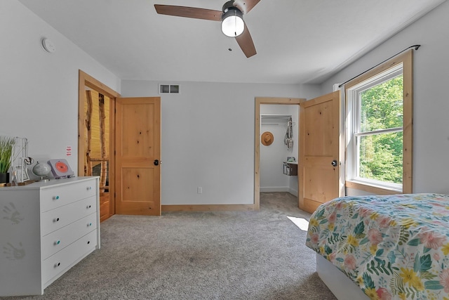 9725 Green Briar Rd, Lake Ann, MI 49650 - bedroom featuring light carpet and a ceiling fan
