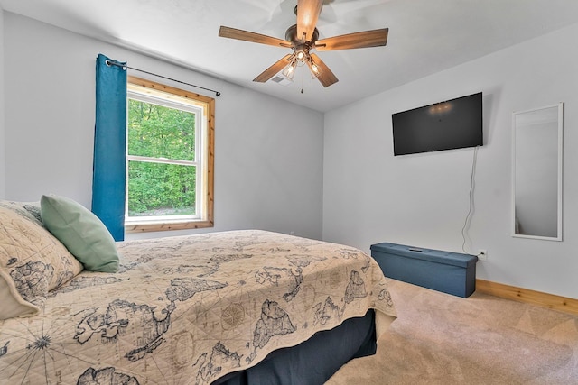 9725 Green Briar Rd, Lake Ann, MI 49650 - bedroom with carpet floors and a ceiling fan