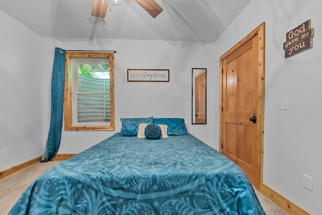 9725 Green Briar Rd, Lake Ann, MI 49650 - bedroom featuring a ceiling fan and light carpet
