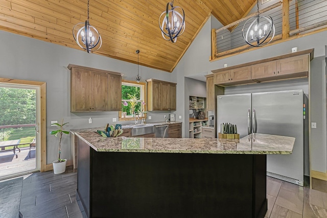 9725 Green Briar Rd, Lake Ann, MI 49650 - kitchen with a chandelier, wooden ceiling, stainless steel appliances, high vaulted ceiling, and light stone counters