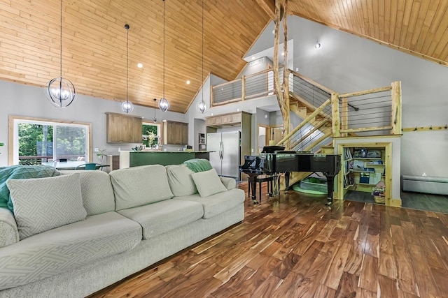 9725 Green Briar Rd, Lake Ann, MI 49650 - living room featuring high vaulted ceiling, dark wood-style floors, wood ceiling, and baseboard heating