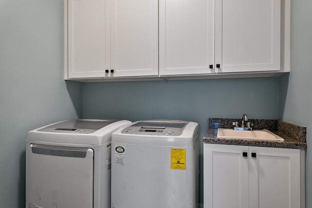 55135 Hanford Ct, Utica, MI 48316 - laundry room with cabinet space and washing machine and clothes dryer