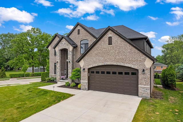 55135 Hanford Ct, Utica, MI 48316 - french country inspired facade featuring brick siding, a front yard, concrete driveway, a garage, and stone siding