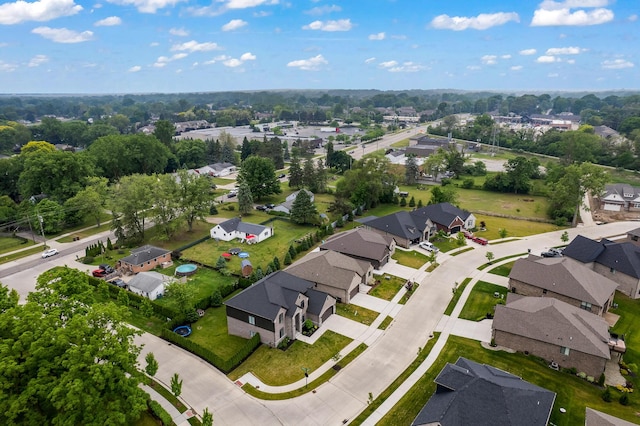 55135 Hanford Ct, Utica, MI 48316 - aerial perspective of suburban area featuring a tree filled landscape