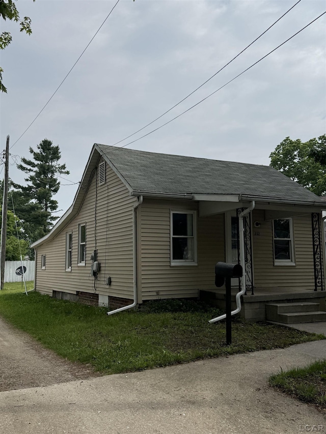 212 W Union St, Morenci, MI 49256 - view of front of house with roof with shingles and a porch