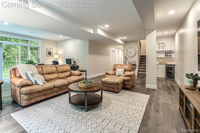 10327 9 Mile Rd, Whitmore Lake, MI 48189 - living room featuring dark wood finished floors, wine cooler, recessed lighting, a bar, and stairway