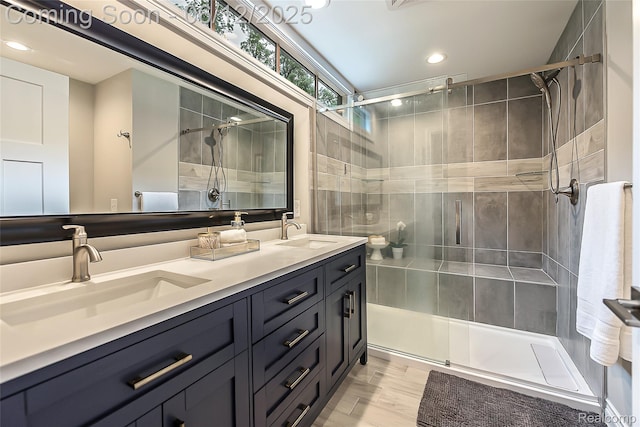10327 9 Mile Rd, Whitmore Lake, MI 48189 - full bath featuring a shower stall, double vanity, and recessed lighting