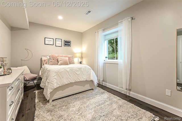 10327 9 Mile Rd, Whitmore Lake, MI 48189 - bedroom with dark wood finished floors and recessed lighting
