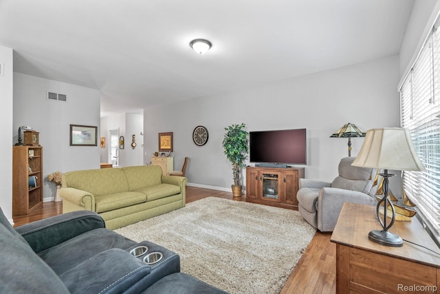 1156 Fairway Dr, Pontiac, MI 48340 - living room featuring wood finished floors and baseboards