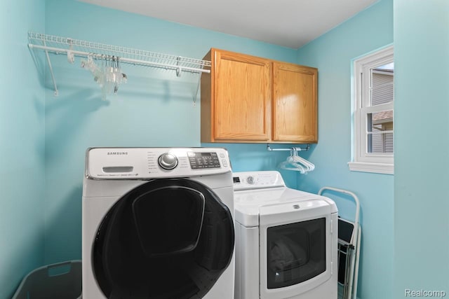 11118 Strathmore Ct, Grand Blanc, MI 48439 - washroom with cabinet space and separate washer and dryer