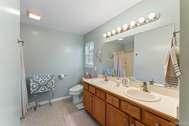 11118 Strathmore Ct, Grand Blanc, MI 48439 - full bath featuring double vanity, toilet, curtained shower, baseboards, and a textured ceiling