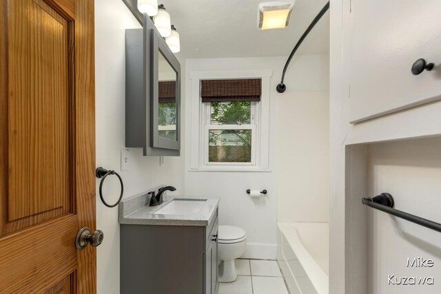 16742 148th Ave, Spring Lake, MI 49456 - bathroom with tile patterned flooring, vanity, toilet, and shower / bath combination
