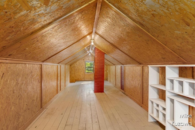 16742 148th Ave, Spring Lake, MI 49456 - bonus room featuring vaulted ceiling, hardwood / wood-style floors, and wooden walls