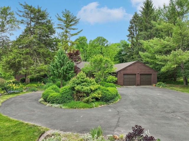 3377 Timberwood Ln, Ann Arbor, MI 48103 - view of front facade featuring driveway and an attached garage