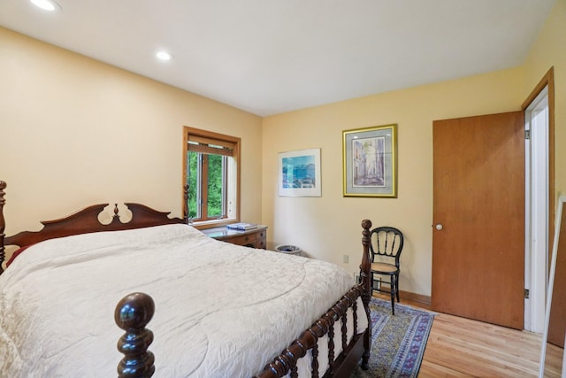 3377 Timberwood Ln, Ann Arbor, MI 48103 - bedroom with light wood-style flooring, recessed lighting, and baseboards