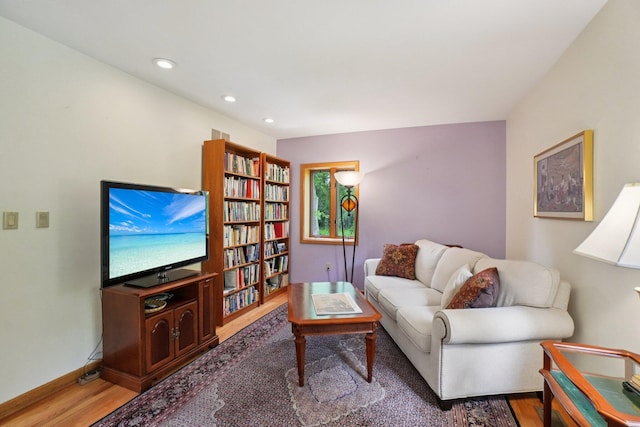 3377 Timberwood Ln, Ann Arbor, MI 48103 - living room featuring wood finished floors, baseboards, and recessed lighting