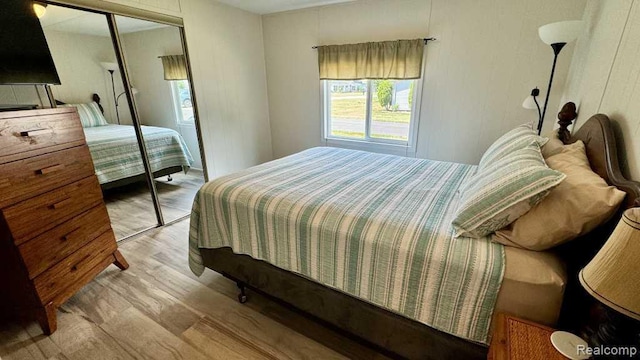 3840 Beech St, Burtchville, MI 48059 - bedroom featuring a closet and light wood finished floors