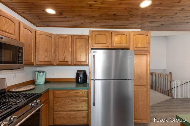 3882 40th St, Hamilton, MI 49419 - kitchen featuring appliances with stainless steel finishes, wooden ceiling, dark countertops, wood finished floors, and recessed lighting