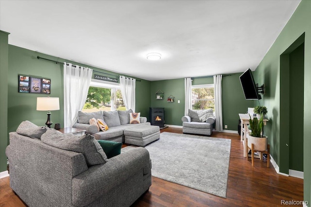 7569 S Durand Rd, Durand, MI 48429 - living area with baseboards and dark wood-style flooring