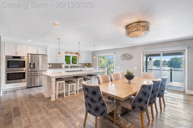 16039 Knobhill Dr, Argentine, MI 48451 - dining area featuring light wood finished floors and recessed lighting
