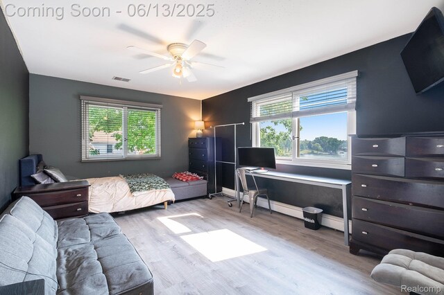16039 Knobhill Dr, Argentine, MI 48451 - bedroom with wood finished floors and ceiling fan
