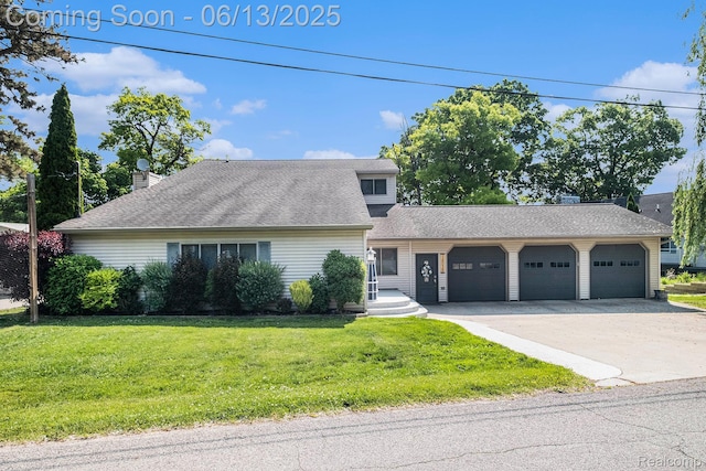 16039 Knobhill Dr, Argentine, MI 48451 - view of front of home featuring an attached garage, driveway, a front lawn, a chimney, and a shingled roof