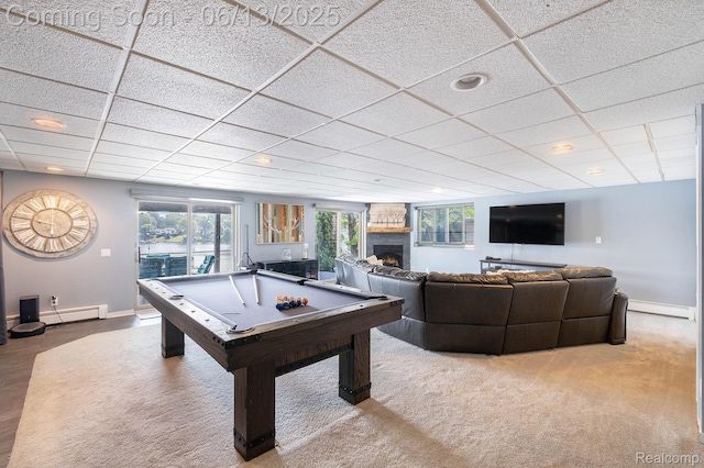 16039 Knobhill Dr, Argentine, MI 48451 - recreation room featuring pool table, baseboards, a warm lit fireplace, a drop ceiling, and carpet
