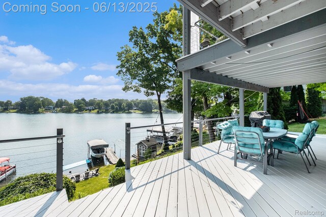 16039 Knobhill Dr, Argentine, MI 48451 - wooden deck with a water view and outdoor dining space