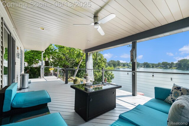 16039 Knobhill Dr, Argentine, MI 48451 - wooden terrace with a water view and ceiling fan