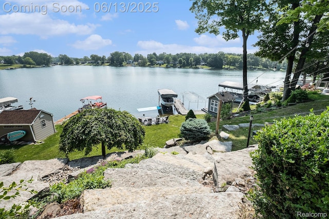 16039 Knobhill Dr, Argentine, MI 48451 - water view featuring a dock
