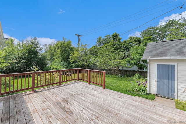 1111 W Park St, Lapeer, MI 48446 - deck featuring view of wooded area