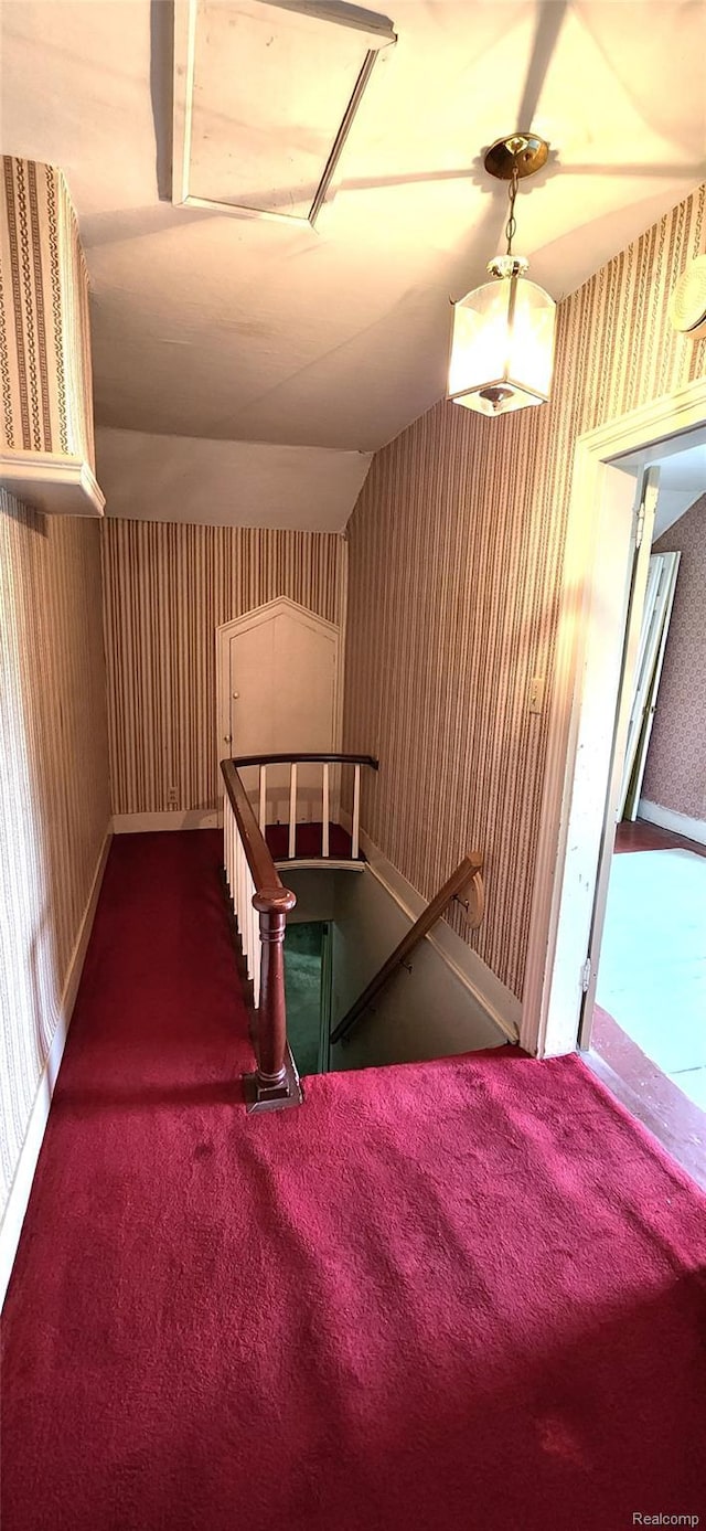 1111 W Park St, Lapeer, MI 48446 - unfurnished bedroom with wallpapered walls, carpet flooring, and baseboards
