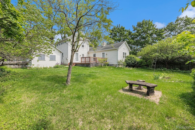 1111 W Park St, Lapeer, MI 48446 - view of green lawn featuring a deck