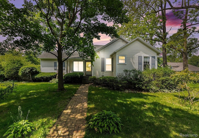 1111 W Park St, Lapeer, MI 48446 - single story home featuring a front lawn