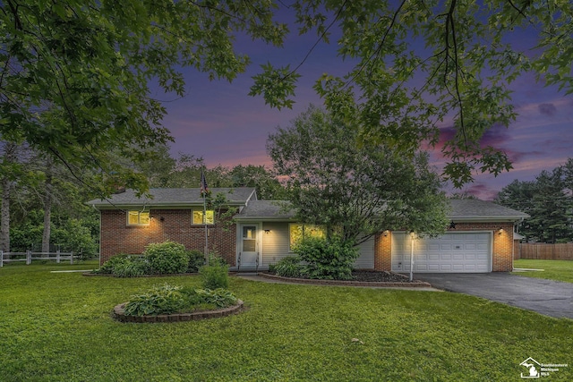 6280 Secor Rd, Lambertville, MI 48144 - view of front of property featuring driveway, a garage, and brick siding
