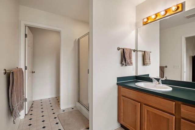 1754 Hightree Dr SW, Byron Center, MI 49315 - full bath featuring vanity, a shower stall, and baseboards