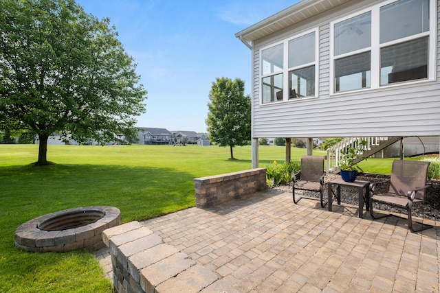 1754 Hightree Dr SW, Byron Center, MI 49315 - view of patio featuring an outdoor fire pit and stairs