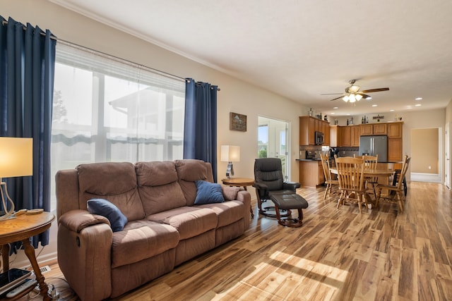 1754 Hightree Dr SW, Byron Center, MI 49315 - living room with a ceiling fan, light wood finished floors, recessed lighting, and baseboards