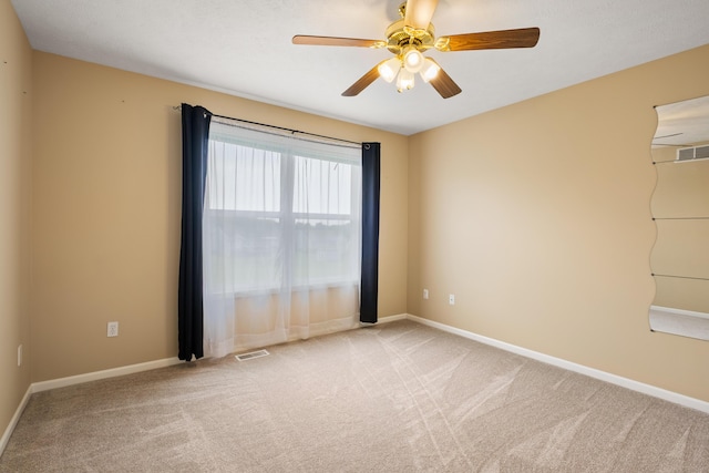 1754 Hightree Dr SW, Byron Center, MI 49315 - carpeted empty room with a ceiling fan and baseboards