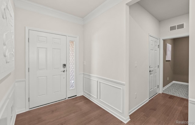 16136 Conifer Ln, Clinton Township, MI 48038 - entrance foyer with dark wood-style floors, a wainscoted wall, and ornamental molding