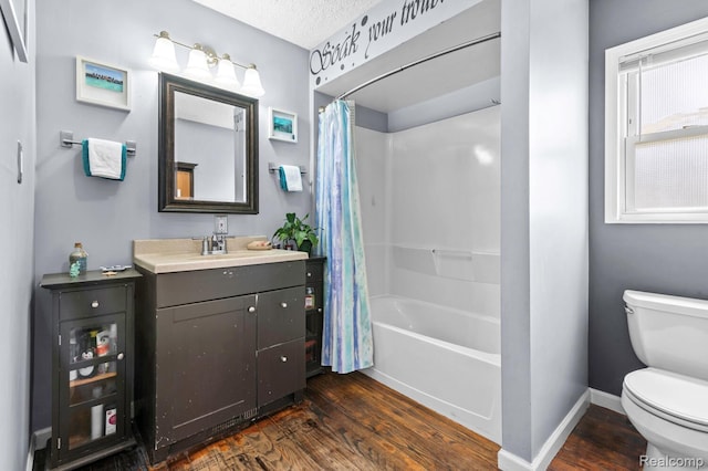 33989 Richard St, Canton, MI 48184 - bathroom featuring wood finished floors, vanity, and shower / bath combo