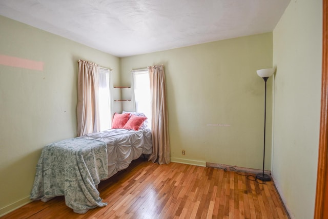 402 Division St, Union City, MI 49094 - bedroom with light wood-type flooring and baseboards