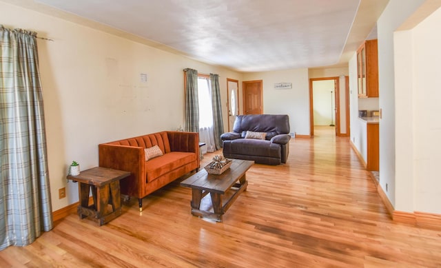 402 Division St, Union City, MI 49094 - living area with light wood-style flooring and baseboards