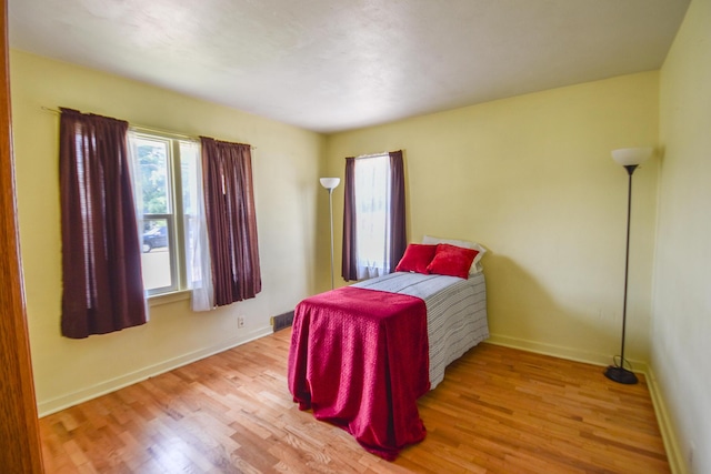 402 Division St, Union City, MI 49094 - bedroom with wood finished floors and baseboards