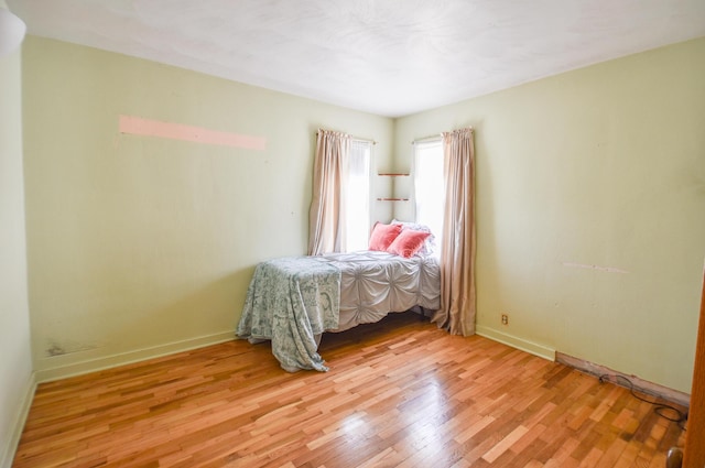 402 Division St, Union City, MI 49094 - bedroom featuring light wood-style floors and baseboards